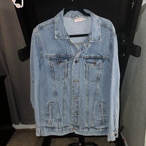 Nickelodeon Light Blue Denim Jacket with Orange Logo Tag and back design